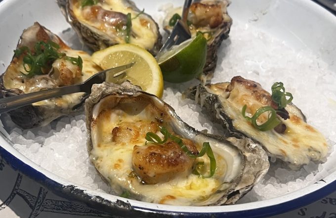 Grilled oysters with lemon and lime on ice at Gatlin's Fins and Feathers
