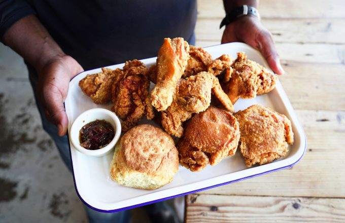 Fried chicken platter with biscuits and dipping sauce at Gatlin's Fins and Feathers